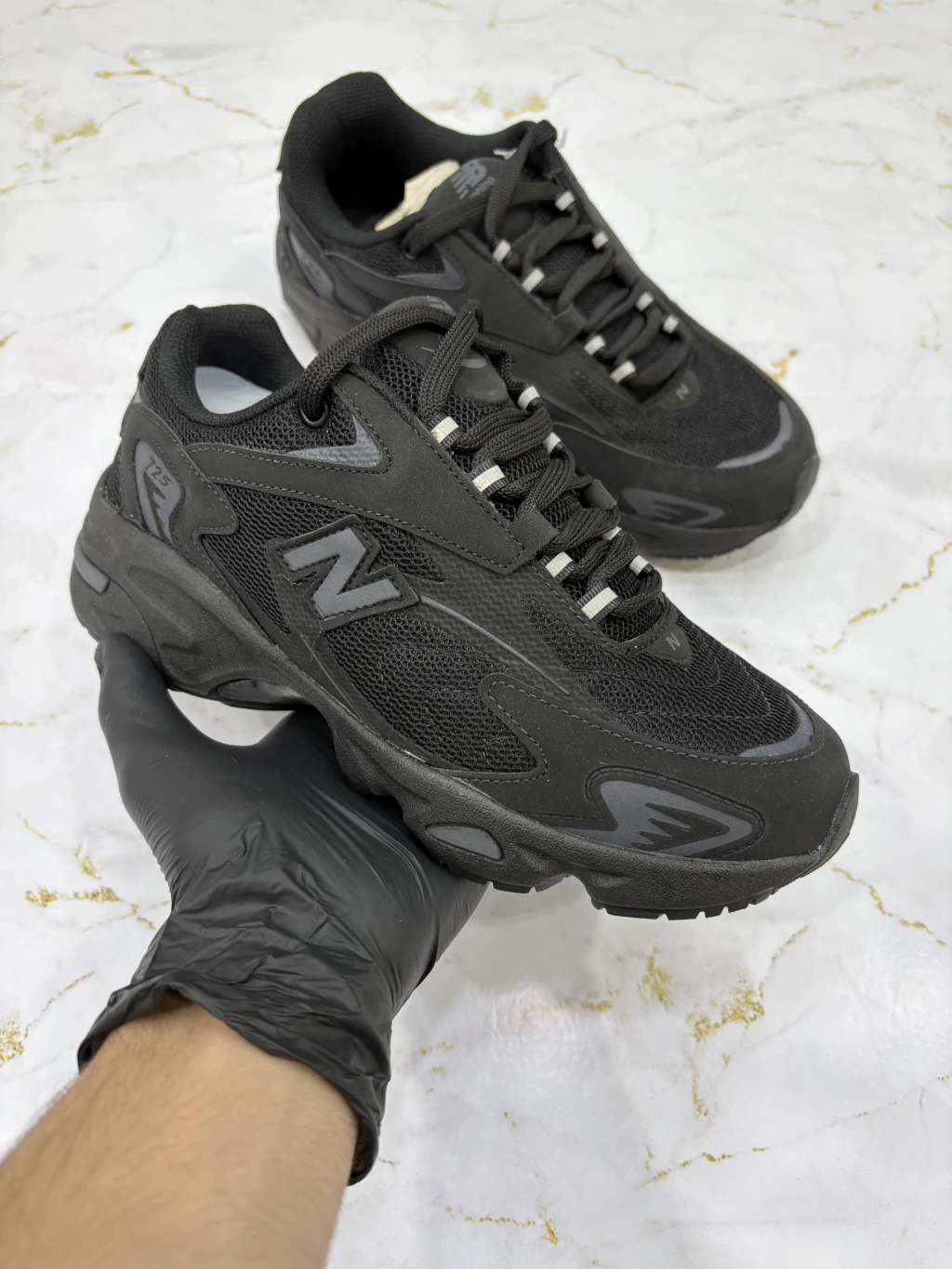 NB 725 “Black”